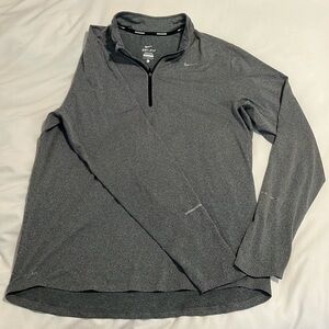 Men’s Nike Dri-Fit half zip pullover.